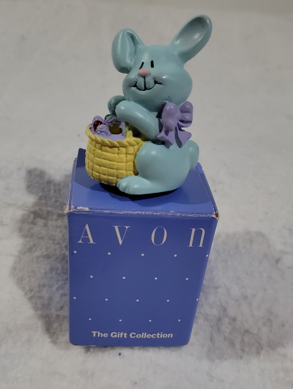 Avon Pastel Blue Bunny Figurine with Yellow Basket Musical
